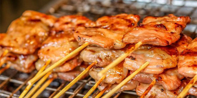 grilled meat threaded on a bamboo stick