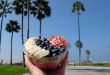 One of the food bloggers in Los Angeles showing a delicious bowl of fruits on Venice beach.