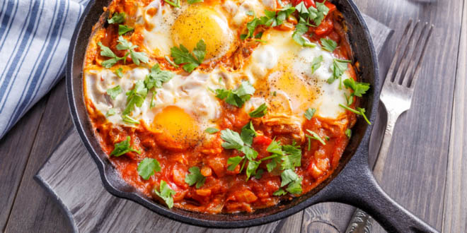 Shakshuka in a frying pan is one of the most typical Israeli eats.