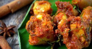 Rendang served on a leaf, one of the dishes recommended in any foodies guide to Brunei.