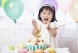Little girl eating Hello Kitty DIY birthday cakes