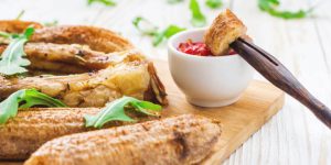 An example of African breakfast recipes: grilled tilapia and chili plantains.