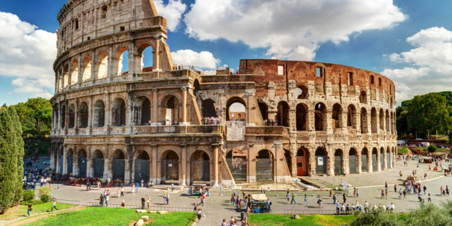 Scenic view of the Colosseum ruins in summer, an unmissable stop when spending 72 hours in Rome.