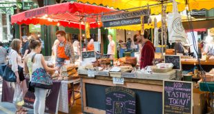 Specialty food stalls at Borough Market, one of the best street food markets in London