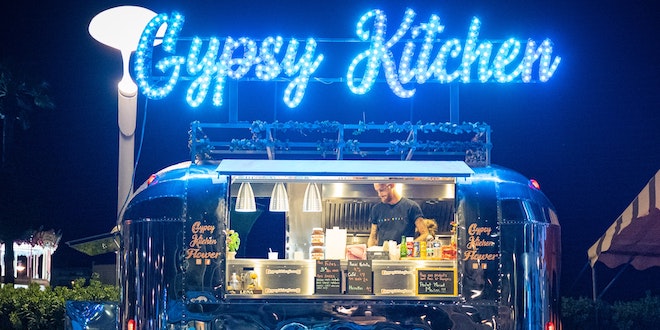 Serving chicken from a food truck